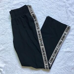 Nike pro women tear away full snap up pants. Size medium